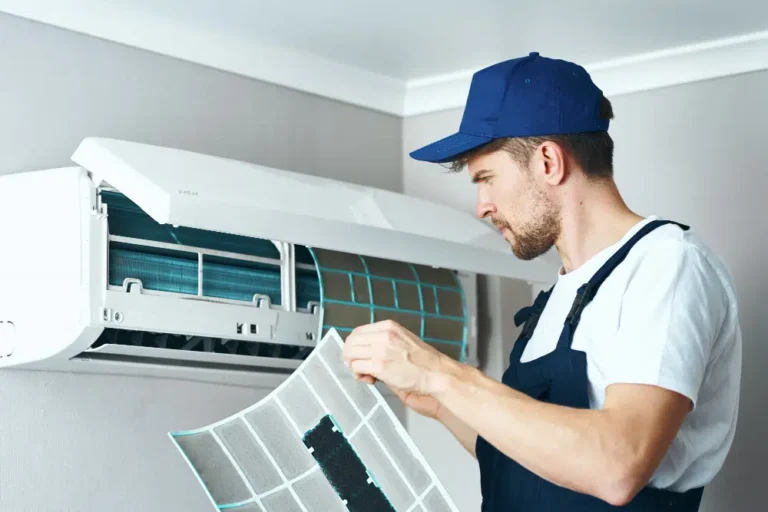 Home man repair cleaning air conditioner worker home