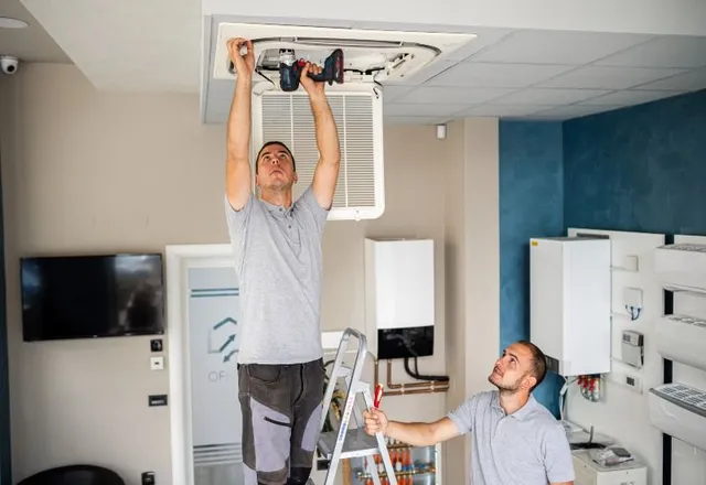 Home technician installing air conditioner 640w
